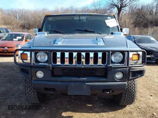 2005 Hummer H2 SUV with VIN 5GRGN23U15H117796, listed as a IAAI auction lot 41543913 with 195,560 mi miles. Bid and sale history available at carsss.com. Image 12.