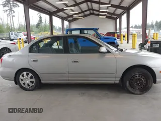 2002 Hyundai Elantra GLS z VIN KMHDN45D52U340239, wystawiony jako IAAI lot #42260604 z przebiegiem 288 297 mil mil oraz . Historia ofert i sprzedaży dostępna na DreamBid. Obrazek 14.