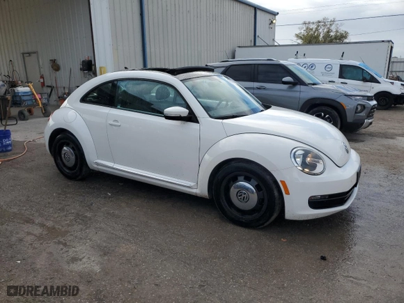 2012 Volkswagen Beetle 2.5L w/Sun/Sound/Nav PZEV with VIN 3VWHP7AT0CM651997, listed as a Copart auction lot 79121014 with 45,560 mi miles and Salvage Title. Bid and sale history available at carsss.com. Image 4.