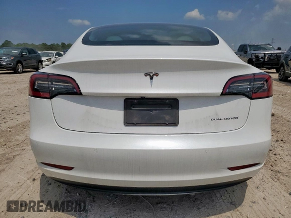 2021 Tesla Model 3 Long Range z VIN 5YJ3E1EB1MF049049, wystawiony jako Copart lot #58432885 z przebiegiem 22 185 mil mil oraz Szkoda całkowita • Salvage title. Historia ofert i sprzedaży dostępna na DreamBid. Obrazek 6.
