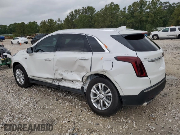 2024 Cadillac XT5 FWD Luxury with VIN 1GYKNAR4XRZ747310, listed as a Copart auction lot 55598585 with 14,371 mi miles and Salvage title. Bid and sale history available at DreamBid. Image 2.