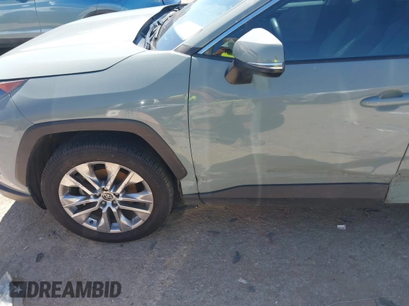 2021 Toyota RAV4 XLE Premium with VIN 2T3C1RFV0MW140682, listed as a IAAI auction lot 42315813 with 98,267 mi miles and . Bid and sale history available at DreamBid. Image 6.