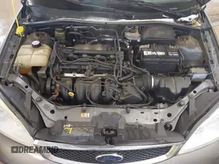 2005 Ford Focus SE with VIN 1FAFP36N45W158796, listed as a IAAI auction lot 41823987 with 145,803 mi miles and . Bid and sale history available at carsss.com. Image 10.