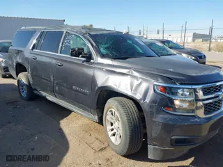 2015 Chevrolet Suburban LT with VIN 1GNSKJKCXFR701284, listed as a IAAI auction lot 41756059 with 1 mi miles. Bid and sale history available at carsss.com. Image 1.