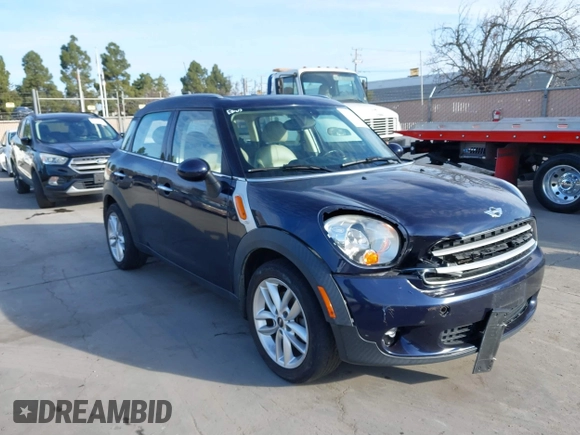 2014 MINI Countryman with VIN WMWZB3C50EWR42268, listed as a IAAI auction lot 41845750 with 117,192 mi miles and . Bid and sale history available at DreamBid. Image 6.