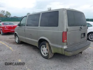 2004 GMC Safari with VIN 1GKDM19X84B500742, listed as a IAAI auction lot 42038034 with 136,127 mi miles. Bid and sale history available at carsss.com. Image 3.