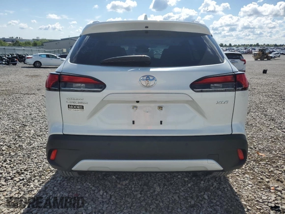 2023 Toyota Corolla Cross XLE with VIN 7MUDAAAG5PV068355, listed as a Copart auction lot 58121795 with 25,667 mi miles and Salvage title. Bid and sale history available at DreamBid. Image 6.