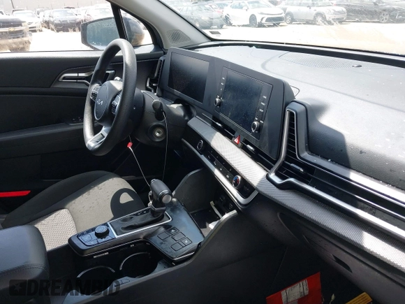 2024 Kia Sportage LX with VIN KNDPUCDF6R7283396, listed as a IAAI auction lot 42120724 with 28,387 mi miles and . Bid and sale history available at DreamBid. Image 5.