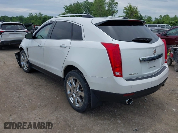 2012 Cadillac SRX Performance Collection with VIN 3GYFNEE34CS579352, listed as a IAAI auction lot 42627607 with 168,752 mi miles and . Bid and sale history available at DreamBid. Image 3.