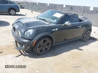 2012 MINI Roadster S with VIN WMWSY3C56CT144520, listed as a IAAI auction lot 41818205 with 86,836 mi miles and . Bid and sale history available at DreamBid. Image 17.