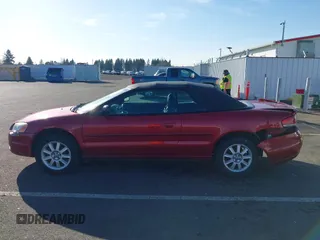 2005 Chrysler Sebring GTC with VIN 1C3EL75R35N690113, listed as a IAAI auction lot 41745228 with 144,868 mi miles and . Bid and sale history available at DreamBid. Image 14.