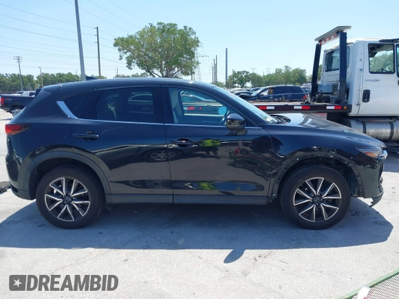2017 Mazda CX-5 Grand Touring with VIN JM3KFBDL6H0200830, listed as a IAAI auction lot 42005145 with 90,510 mi miles. Bid and sale history available at carsss.com. Image 13.