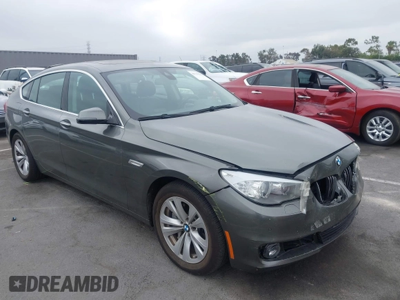 2015 BMW 5 Series 535i Gran Turismo z VIN WBA5M2C5XFD872228, wystawiony jako IAAI lot #42737501 z przebiegiem 71 027 mil mil oraz . Historia ofert i sprzedaży dostępna na DreamBid. Obrazek 1.