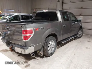 2014 Ford F-150 XL with VIN 1FTFW1EF5EFB71651, listed as a IAAI auction lot 42051456 with 143,945 mi miles and . Bid and sale history available at DreamBid. Image 4.