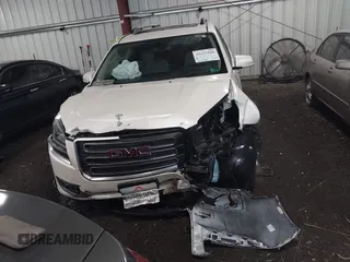 2014 GMC Acadia SLT z VIN 1GKKVSKD4EJ250739, wystawiony jako IAAI lot #42257848 z przebiegiem 78 672 mil mil oraz . Historia ofert i sprzedaży dostępna na DreamBid. Obrazek 12.