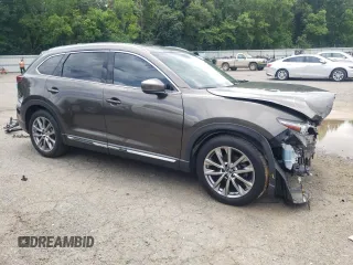 2018 Mazda CX-9 Grand Touring с VIN JM3TCADY9J0205299, выставлен на аукционе Copart как лот 60306095 с пробегом 113 766 миль миль и Списание • Salvage title. История ставок и продаж доступна на DreamBid. Изображение 4.