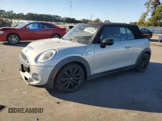 2016 MINI Convertible S with VIN WMWWG9C50G3C22502, listed as a Copart auction lot 76140704 with 60,221 mi miles and Salvage Title. Bid and sale history available at DreamBid. Image 1.