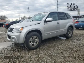 2012 Suzuki Grand Vitara Premium z VIN JS3TD0D21C4100197, wystawiony jako Copart lot #46475875 z przebiegiem 194 881 mil mil oraz Tytuł czysty. Historia ofert i sprzedaży dostępna na DreamBid. Obrazek 1.