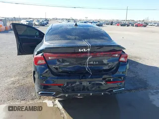 2022 Kia K5 GT-Line z VIN 5XXG64J2XNG139790, wystawiony jako IAAI lot #41737680 z przebiegiem 34 738 mil mil oraz . Historia ofert i sprzedaży dostępna na DreamBid. Obrazek 6.
