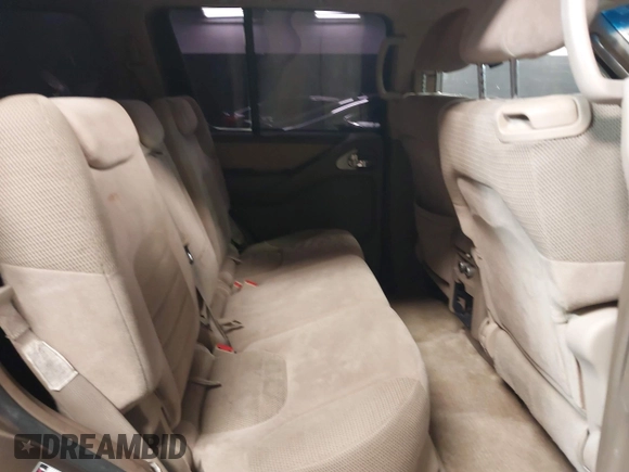 2005 Nissan Pathfinder SE z VIN 5N1AR18W65C703936, wystawiony jako IAAI lot #41271670 z przebiegiem 129 744 mil mil oraz . Historia ofert i sprzedaży dostępna na DreamBid. Obrazek 8.