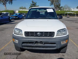 1999 Toyota RAV4 with VIN JT3GP10V2X7064915, listed as a IAAI auction lot 41998544 with 302,351 mi miles and . Bid and sale history available at DreamBid. Image 12.