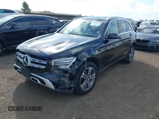 2020 Mercedes-Benz GLC 300 with VIN WDC0G8DB7LF718775, listed as a IAAI auction lot 41807370 with 59,120 mi miles and . Bid and sale history available at DreamBid. Image 2.