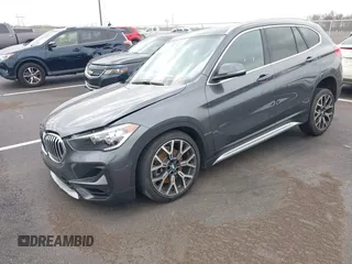 2021 BMW X1 sDrive28i with VIN WBXJG7C07M5S08831, listed as a IAAI auction lot 41829653 with 51,052 mi miles. Bid and sale history available at carsss.com. Image 2.