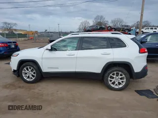 2015 Jeep Cherokee Latitude z VIN 1C4PJMCS9FW625521, wystawiony jako IAAI lot #41894602 z przebiegiem 112 865 mil mil oraz . Historia ofert i sprzedaży dostępna na DreamBid. Obrazek 14.