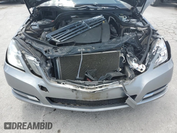 2012 Mercedes-Benz E 350 Luxury with VIN WDDHF8JB5CA604521, listed as a Copart auction lot 58157185 with 143,329 mi miles and Clean title. Bid and sale history available at DreamBid. Image 11.