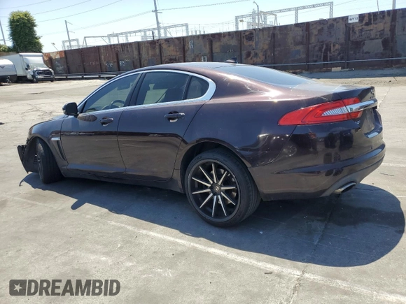 2015 Jaguar XF V6 Portfolio with VIN SAJWA0F79F8U60216, listed as a Copart auction lot 54969245 with 88,954 mi miles and Salvage Title. Bid and sale history available at carsss.com. Image 2.