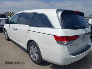 2016 Honda Odyssey SE with VIN 5FNRL5H33GB043303, listed as a IAAI auction lot 42215233 with 67,097 mi miles and . Bid and sale history available at DreamBid. Image 3.