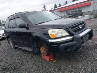 2004 Honda Pilot EX with VIN 2HKYF18674H585328, listed as a IAAI auction lot 41688735 with 214,194 mi miles. Bid and sale history available at carsss.com. Image 1.