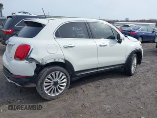 2016 FIAT 500X Lounge z VIN ZFBCFYDT0GP328541, wystawiony jako IAAI lot #42016388 z przebiegiem 134 806 mil mil oraz . Historia ofert i sprzedaży dostępna na DreamBid. Obrazek 13.