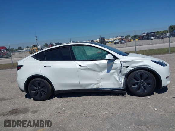 2025 Tesla Model Y Long Range with VIN 7SAYGDED6SF234278, listed as a IAAI auction lot 41781695 with 1,168 mi miles and . Bid and sale history available at DreamBid. Image 12.