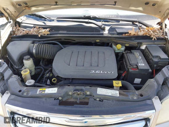 2013 Chrysler Town & Country Touring with VIN 2C4RC1BG8DR559824, listed as a IAAI auction lot 41818237 with 211,248 mi miles. Bid and sale history available at carsss.com. Image 10.