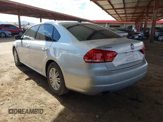 2015 Volkswagen Passat 1.8T Wolfsburg Ed with VIN 1VWAT7A31FC028990, listed as a IAAI auction lot 41778229 with 73,553 mi miles. Bid and sale history available at carsss.com. Image 3.