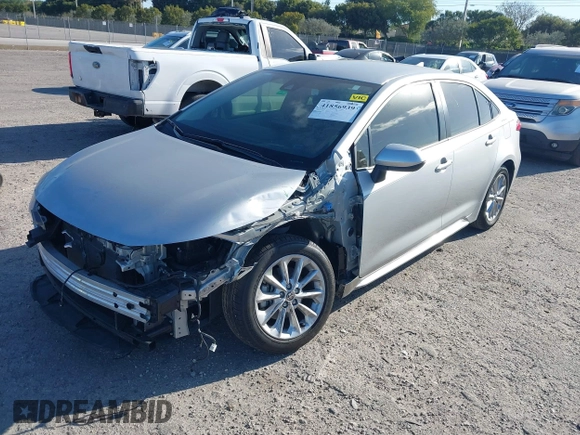 2022 Toyota Corolla LE with VIN JTDVPMAE7N3016592, listed as a IAAI auction lot 41856939 with 28,597 mi miles. Bid and sale history available at carsss.com. Image 2.