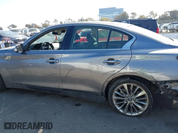 2019 Infiniti Q50 Luxe with VIN JN1EV7APXKM511385, listed as a IAAI auction lot 41647699 with 34,489 mi miles and . Bid and sale history available at DreamBid. Image 14.