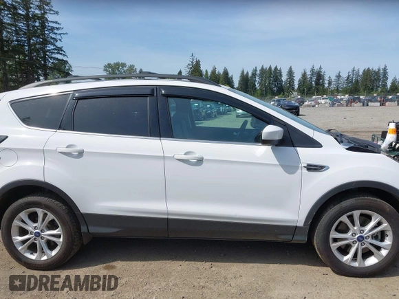 2018 Ford Escape SE with VIN 1FMCU9GD8JUB14879, listed as a IAAI auction lot 42156044 with 91,304 mi miles. Bid and sale history available at carsss.com. Image 14.