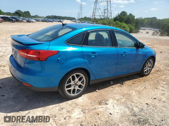 2015 Ford Focus SE with VIN 1FADP3F24FL200786, listed as a Copart auction lot 62662855 with 90,790 mi miles and Salvage title. Bid and sale history available at DreamBid. Image 3.
