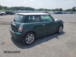 2011 MINI Hardtop with VIN WMWSU3C51BTX95581, listed as a Copart auction lot 60443995 with 157,213 mi miles and Salvage title. Bid and sale history available at DreamBid. Image 3.