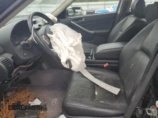 2003 Infiniti G35 w/Leather z VIN JNKCV51E03M311591, wystawiony jako Copart lot #55919685 z przebiegiem 107 777 mil mil oraz Szkoda całkowita • Salvage title. Historia ofert i sprzedaży dostępna na DreamBid. Obrazek 7.