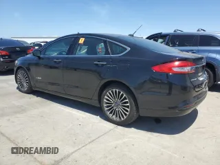 2017 Ford Fusion Hybrid SE with VIN 3FA6P0LU5HR399655, listed as a Copart auction lot 61869085 with 117,420 mi miles and Salvage title. Bid and sale history available at DreamBid. Image 2.