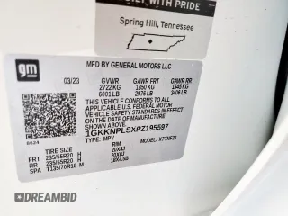 2023 GMC Acadia Denali with VIN 1GKKNPLSXPZ195597, listed as a Copart auction lot 61125815 with 7,564 mi miles and Salvage title. Bid and sale history available at DreamBid. Image 13.