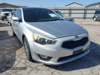 2015 Kia Cadenza Premium with VIN KNALN4D74F5173557, listed as a IAAI auction lot 41702351 with 104,087 mi miles and . Bid and sale history available at carsss.com. Image 1.