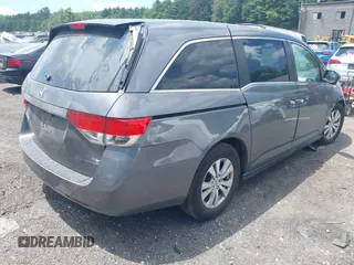 2014 Honda Odyssey EX-L with VIN 5FNRL5H60EB112293, listed as a IAAI auction lot 42537523 with 155,000 mi miles and . Bid and sale history available at DreamBid. Image 4.