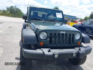 2010 Jeep Wrangler Sport with VIN 1J4AA2D17AL126737, listed as a IAAI auction lot 42237596 with 119,391 mi miles and . Bid and sale history available at carsss.com. Image 6.