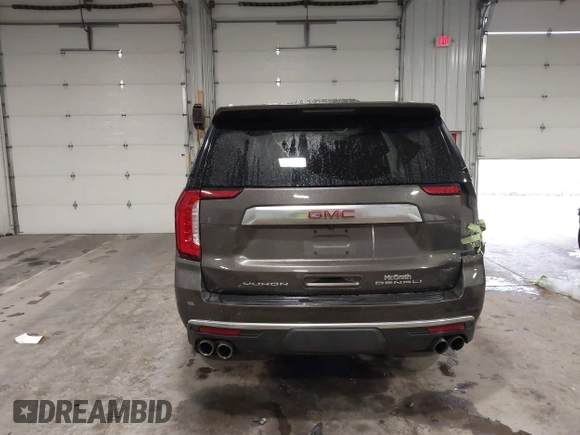 2021 GMC Yukon Denali with VIN 1GKS2DKL8MR409483, listed as a IAAI auction lot 41196214 with 62,684 mi miles. Bid and sale history available at carsss.com. Image 17.