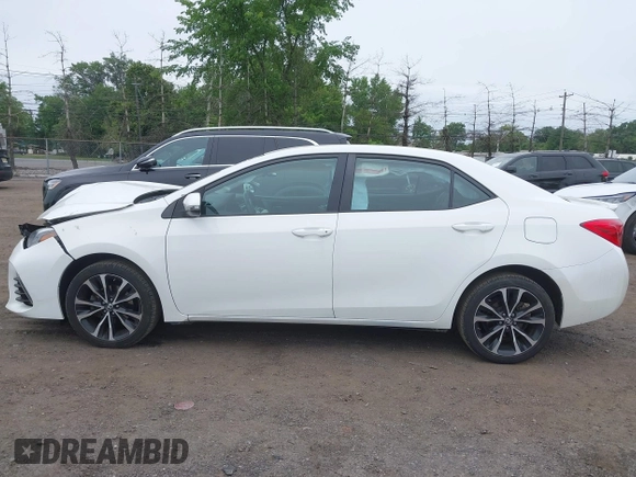 2017 Toyota Corolla L z VIN 2T1BURHE8HC787010, wystawiony jako IAAI lot #42366723 z przebiegiem 104 805 mil mil oraz . Historia ofert i sprzedaży dostępna na DreamBid. Obrazek 14.