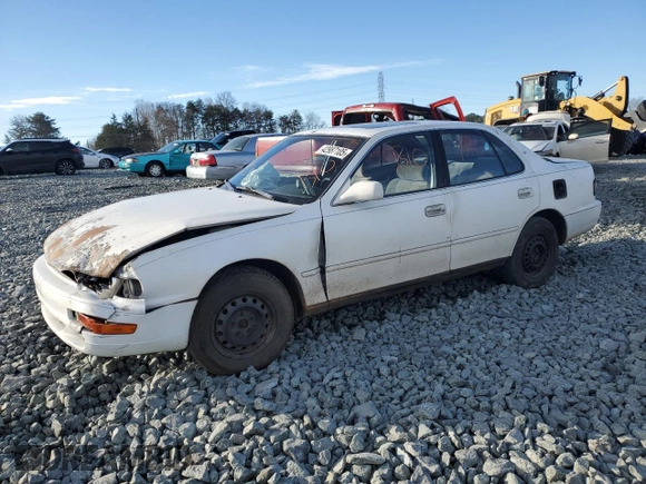 1994 Toyota Camry LE with VIN 4T1SK12E4RU396095, listed as a Copart auction lot 42987105 with 289,218 mi miles and Salvage Title. Bid and sale history available at carsss.com. Image 1.